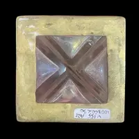 Brass and crystal perfume holder with four small bottles with triangular cross-section.