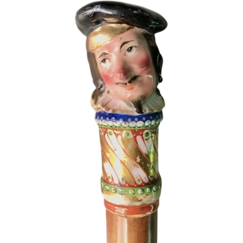 Bâton en porcelaine avec pommeau à figure masculine et canne en malacca.Nymphenburg,Allemagne,