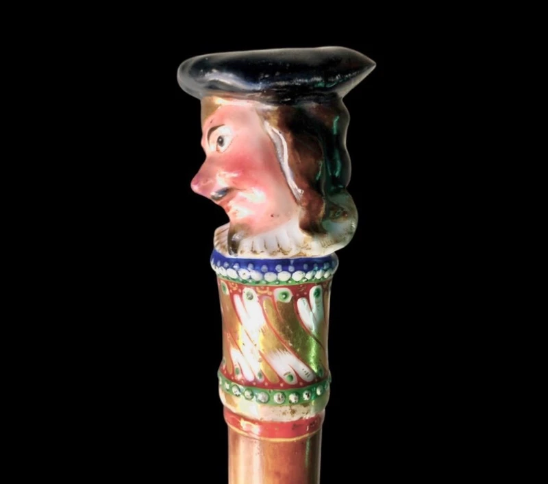 Bâton en porcelaine avec pommeau à figure masculine et canne en malacca.Nymphenburg,Allemagne,