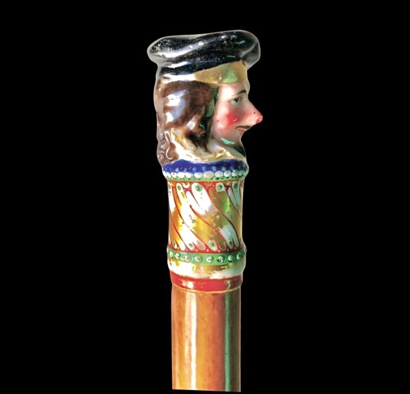 Bâton en porcelaine avec pommeau à figure masculine et canne en malacca.Nymphenburg,Allemagne,