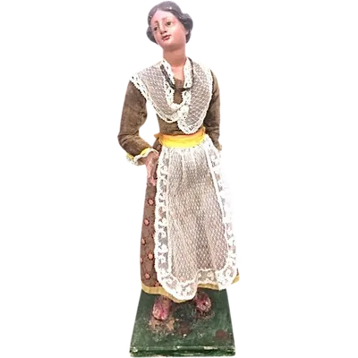 Painted wooden nativity scene figurine depicting peasant woman.Genoa.