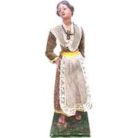 Painted wooden nativity scene figurine depicting peasant woman.Genoa.