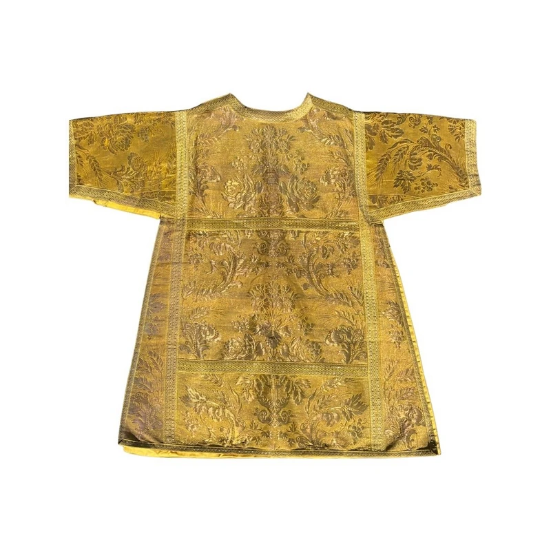 Complete with sacred priestly vestments embroidered in gold thread with floral decorations: