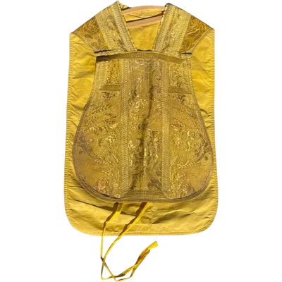 Complete with sacred priestly vestments embroidered in gold thread with floral decorations: