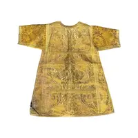 Complete with sacred priestly vestments embroidered in gold thread with floral decorations: