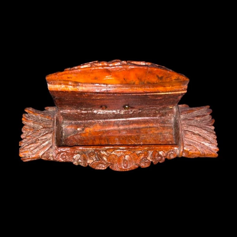 Curozo seed snuff box with pastoral scenes and floral motifs.