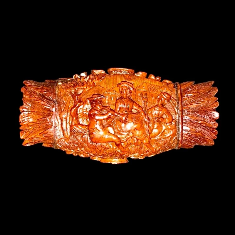 Curozo seed snuff box with pastoral scenes and floral motifs.