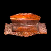 Curozo seed snuff box with pastoral scenes and floral motifs.