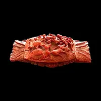 Curozo seed snuff box with pastoral scenes and floral motifs.