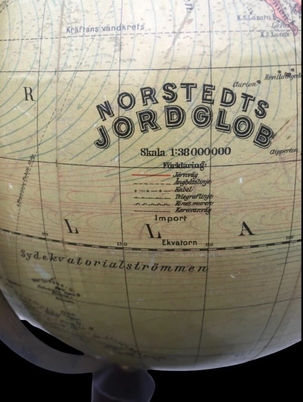 Earth globe with compass included in wooden base, initialed: Norstedts jordglob.Sweden.
