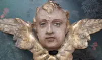Antique sculpture winged head cherub putto angel