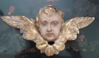 Antique sculpture winged head cherub putto angel