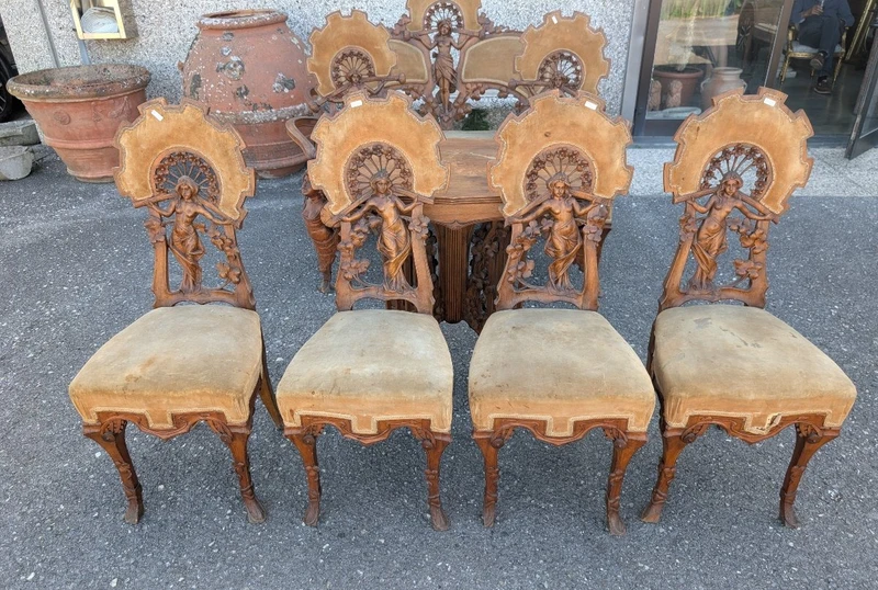 Art Nouveau sitting room set in carved walnut with female figures, late 19th century