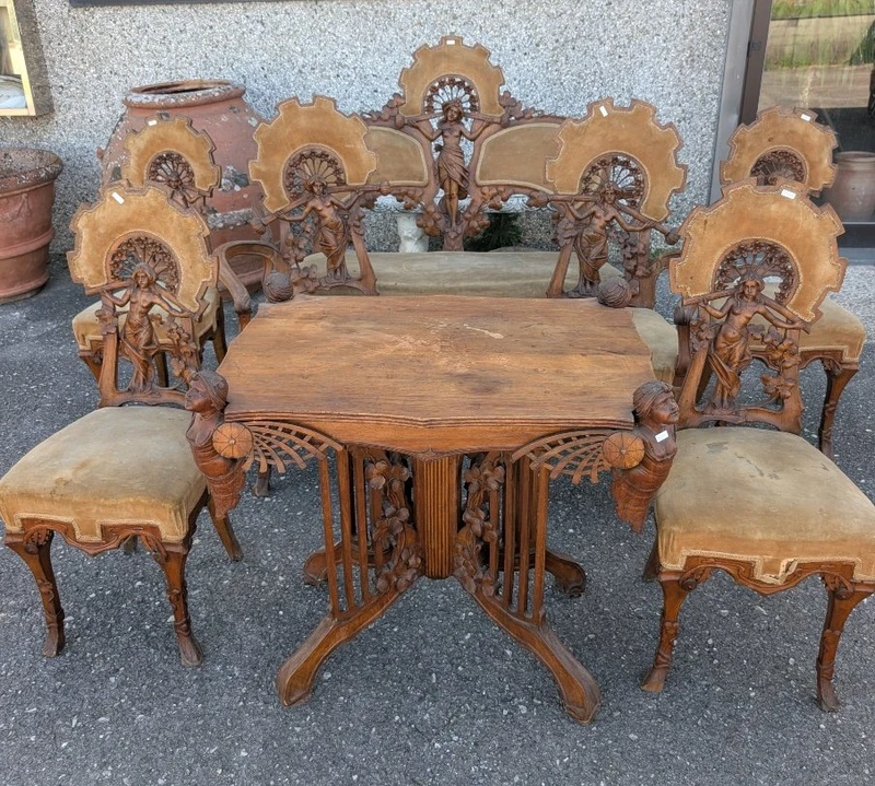 Art Nouveau sitting room set in carved walnut with female figures, late 19th century