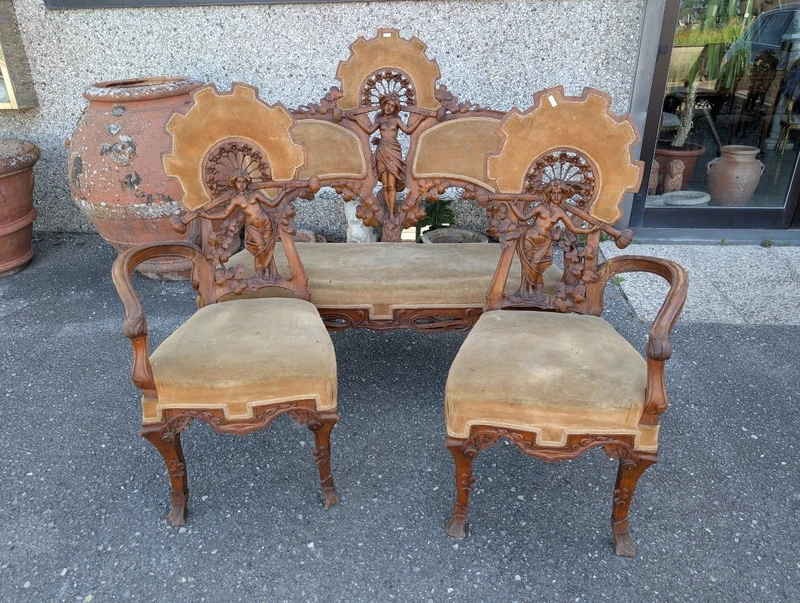 Art Nouveau sitting room set in carved walnut with female figures, late 19th century
