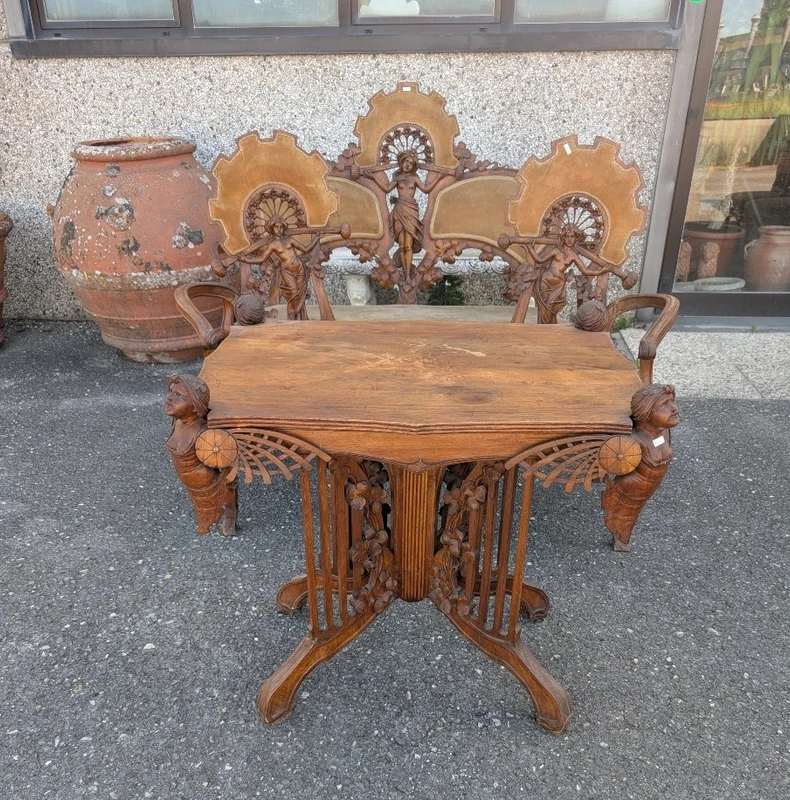 Art Nouveau sitting room set in carved walnut with female figures, late 19th century