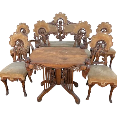 Art Nouveau sitting room set in carved walnut with female figures, late 19th century