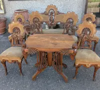 Art Nouveau sitting room set in carved walnut with female figures, late 19th century