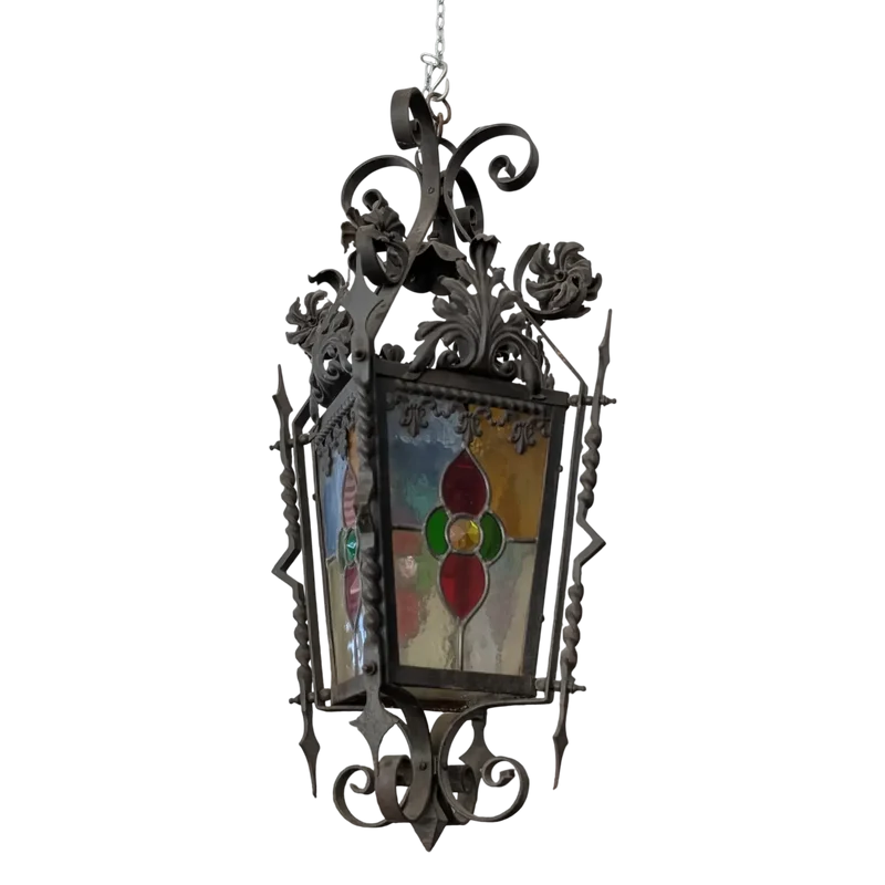 Suspended lantern made of wrought iron and leaded colored glass
