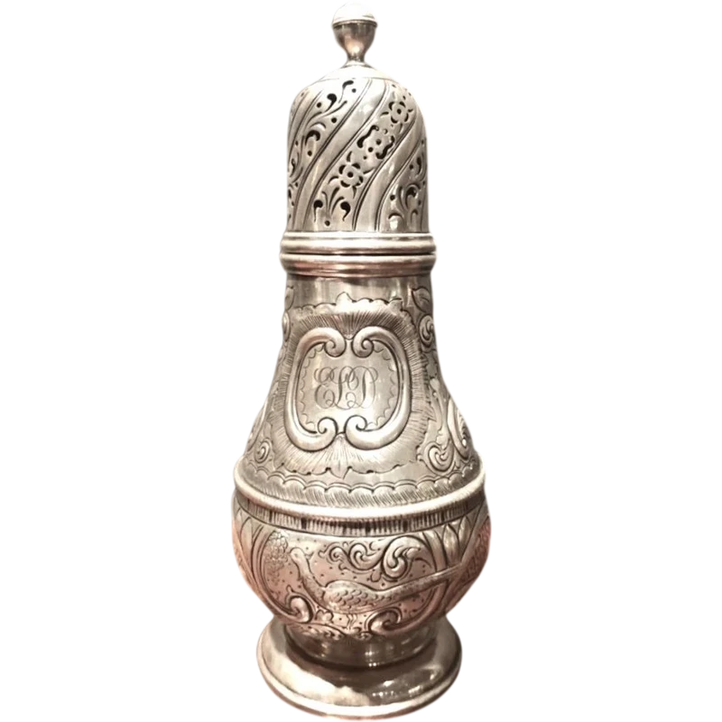 Silver sugar shaker featuring animal motifs, seed beads, and a medallion with engraved initials.