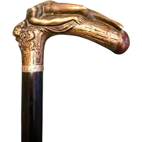 A walking stick with an erotic motif, featuring a bronze handle depicting a reclining nude woman.