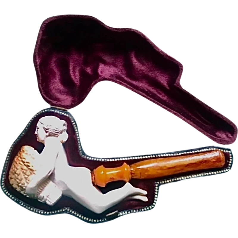 A sea foam pipe featuring an erotic design of a nude woman.