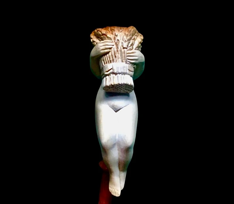 A sea foam pipe featuring an erotic design of a nude woman.