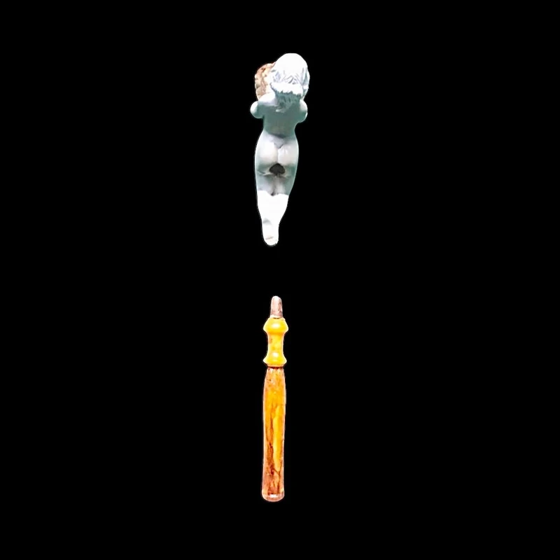 A sea foam pipe featuring an erotic design of a nude woman.