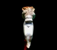 A sea foam pipe featuring an erotic design of a nude woman.