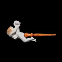 A sea foam pipe featuring an erotic design of a nude woman.