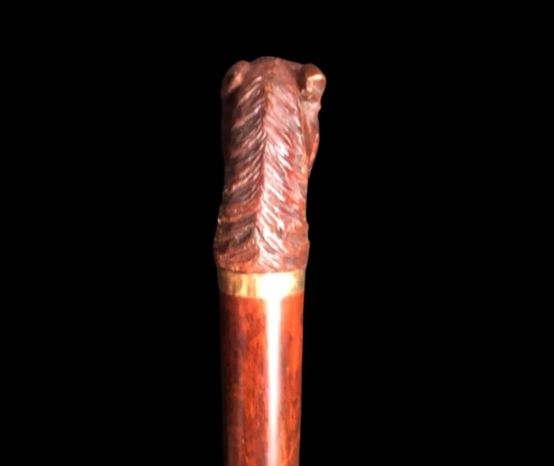 Walking stick with a boxwood knob shaped like a horse's head.