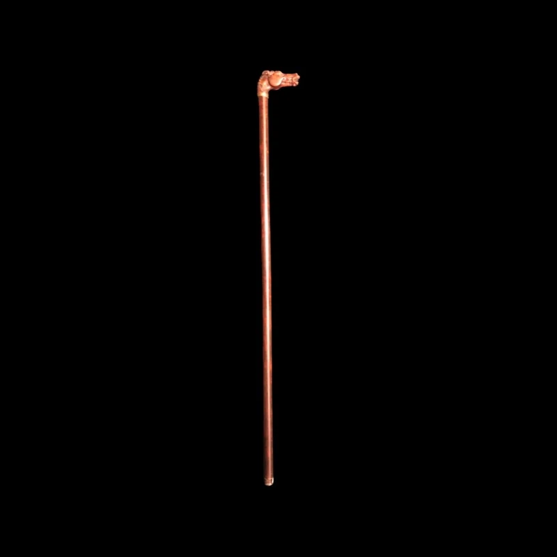 Walking stick with a boxwood knob shaped like a horse's head.