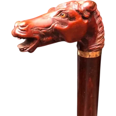 Walking stick with a boxwood knob shaped like a horse's head.