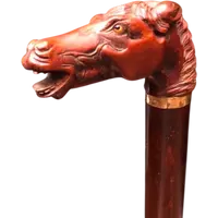 Walking stick with a boxwood knob shaped like a horse's head.