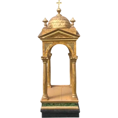 A small shrine-tabernacle made of gilded and marbled wood.