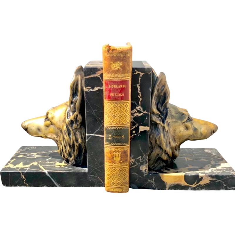 Coppia di fermalibri in bronzo e marmo raffiguranti teste di cane.Firma:H Payen.Francia.