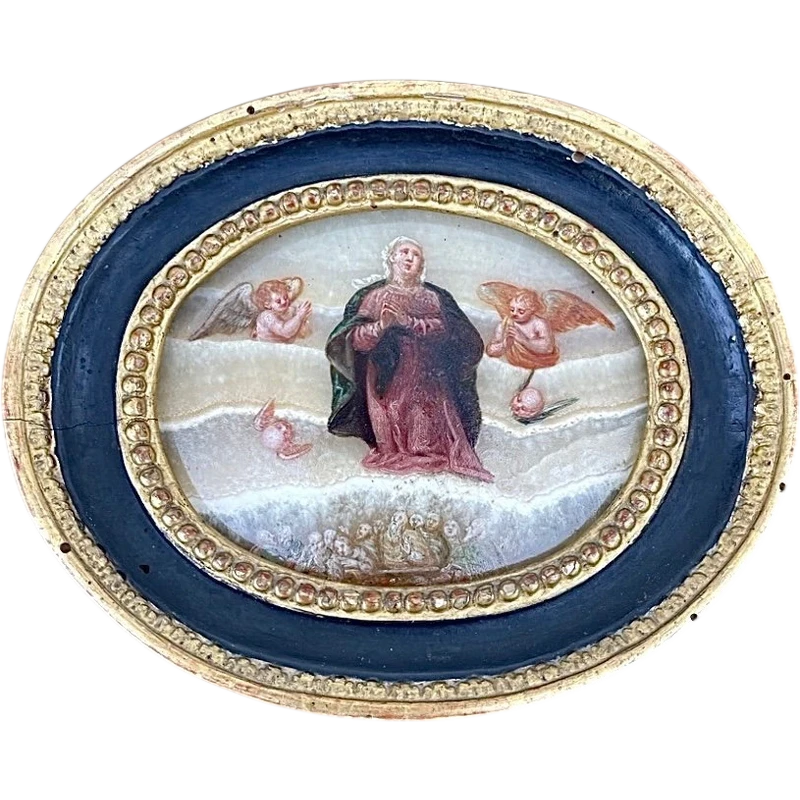 Oval alabaster painting depicting the Virgin Mary with angels and figures.