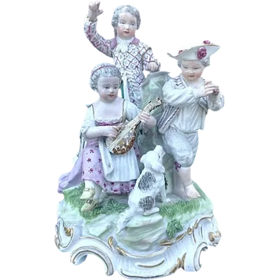 A porcelain figurine set depicting children playing musical instruments. Meissen.