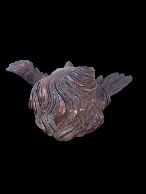 Pair of carved wooden cherubs with a marbled finish. Liguria.