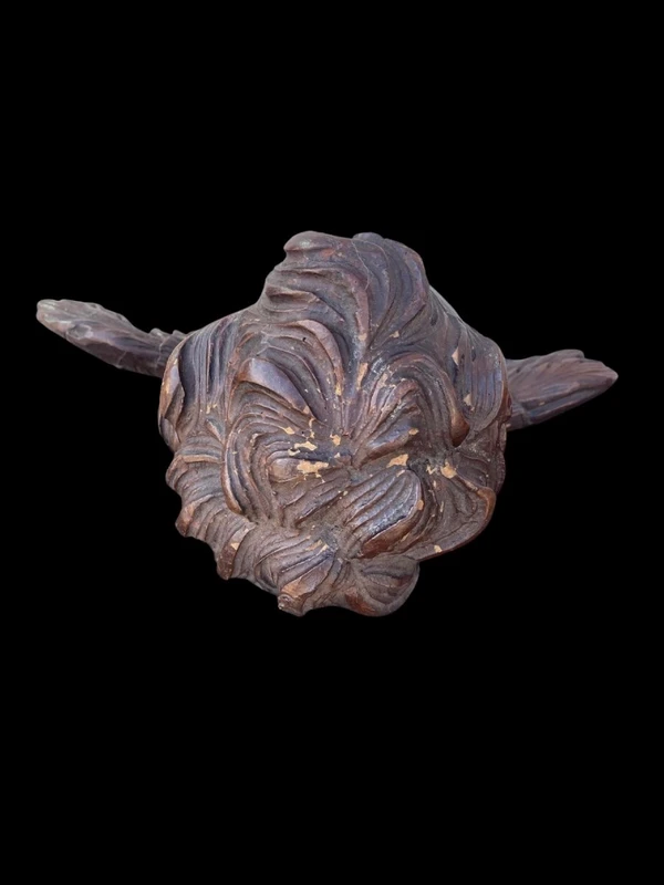Pair of carved wooden cherubs with a marbled finish. Liguria.