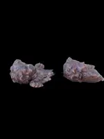 Pair of carved wooden cherubs with a marbled finish. Liguria.
