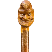 Canne d'une seule pièce en bois de bouleau représentant un joker.