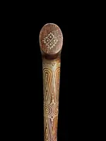 Rosewood walking stick with a Tau-shaped handle featuring geometric decoration in small silver studs