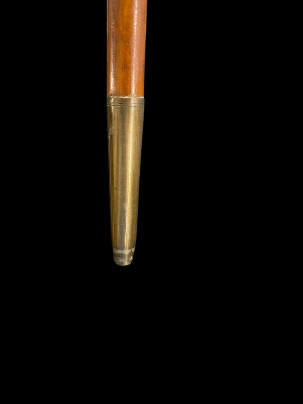 "Compagnon" ceremonial cane in silver with stylized floral and geometric motifs.
