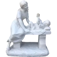 A sculpture in white Carrara marble depicting a mother holding cherries and her child.