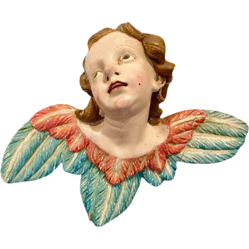Carved and painted wooden cherub. Liguria.