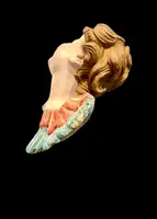 Carved and painted wooden cherub. Liguria.