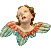 Carved and painted wooden cherub. Liguria.