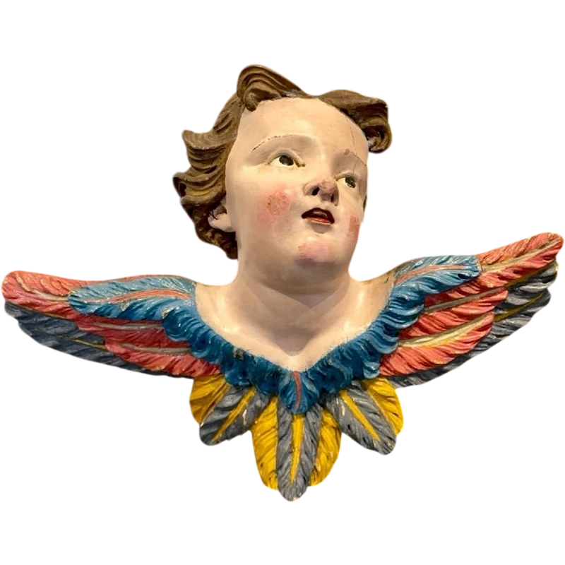 Carved and painted wooden cherub. Liguria.