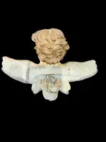 Carved and painted wooden cherub. Liguria.